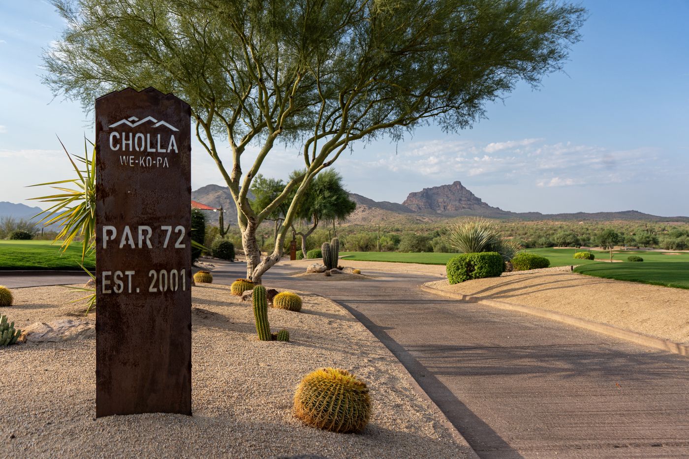 Cholla course sign at We-Ko-Pa reading Par 72, Est. 2001, with Red Mountain behind